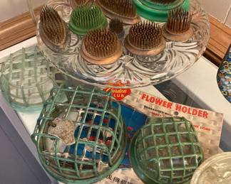 Metal and plastic flower frog collection