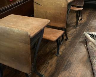Three old school desks