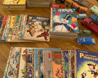 Collection of vintage Golden Books, metal and plastic toys