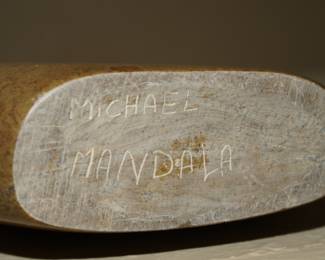 Michael Mandala's signature on the Shona stone carving