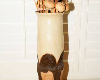 Figural ceramic floor vase with dried florals