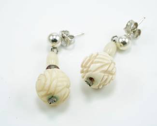 Carved bone puzzle ball drop earrings