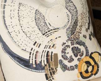 "Around a Stitch" pillow covers by Jules Pansu-there are two available for sale