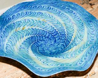 This is a signed lucite art piece-about  22" in diameter