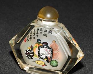 There are several reverse painted snuff bottles available for sale