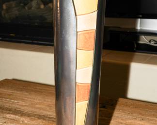 There are three ceramic vases available for sale-in different sizes