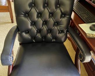 Medium size blue leather desk chair in great condition.