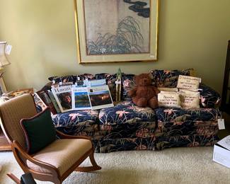 There are 2 floral print sofas in this house, both in very good condition,