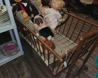 Vintage cradle with old toys
