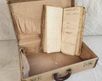 Antique suitcase and ledger