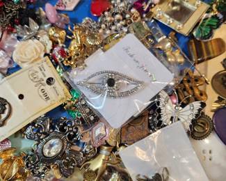 More and more and more...ready to be priced.  Literally, there is so much jewely and jewelry pieces for art. 