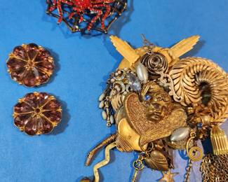 Two Antique Buttons, an Spider Pin and a handcrafted Pin by our client! 