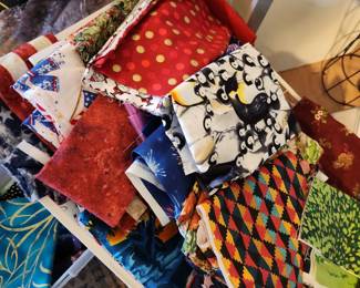 Lots of Fabrics and in this tub is lots of Quilting Squares 