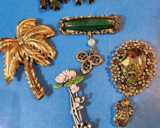 Vintage Earrings above, A mix of Contemporary and Vintage Jewelry pins/brooches 