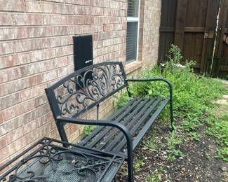 Iron bench and wall decor 