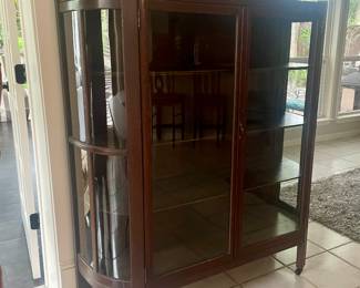 Beautiful curved glass cabinet (has one broken panel) 