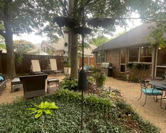 Lots of bird feeders (patio furniture sold to new owners)