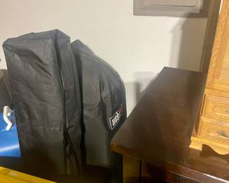 Garage filled with Christmas, furnishings, smoker, pressure washer and tools 