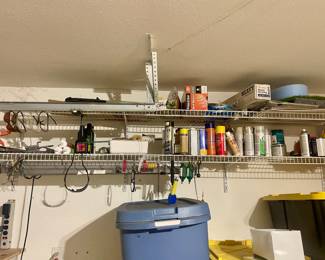 Garage filled with Christmas, furnishings, smoker, pressure washer and tools 