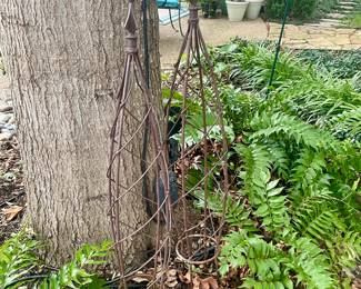 Iron plant covers with finials. 