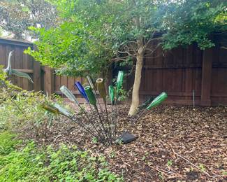 Iron tree with colored bottles for sale 