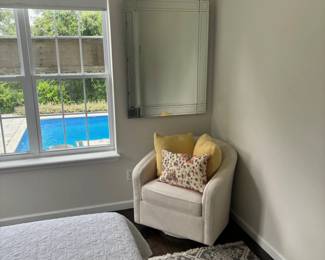 111 mirror and upholstered chair