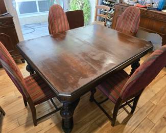 Antique solid wood table with 5 upholstered chairs. Available for pre-sale $150