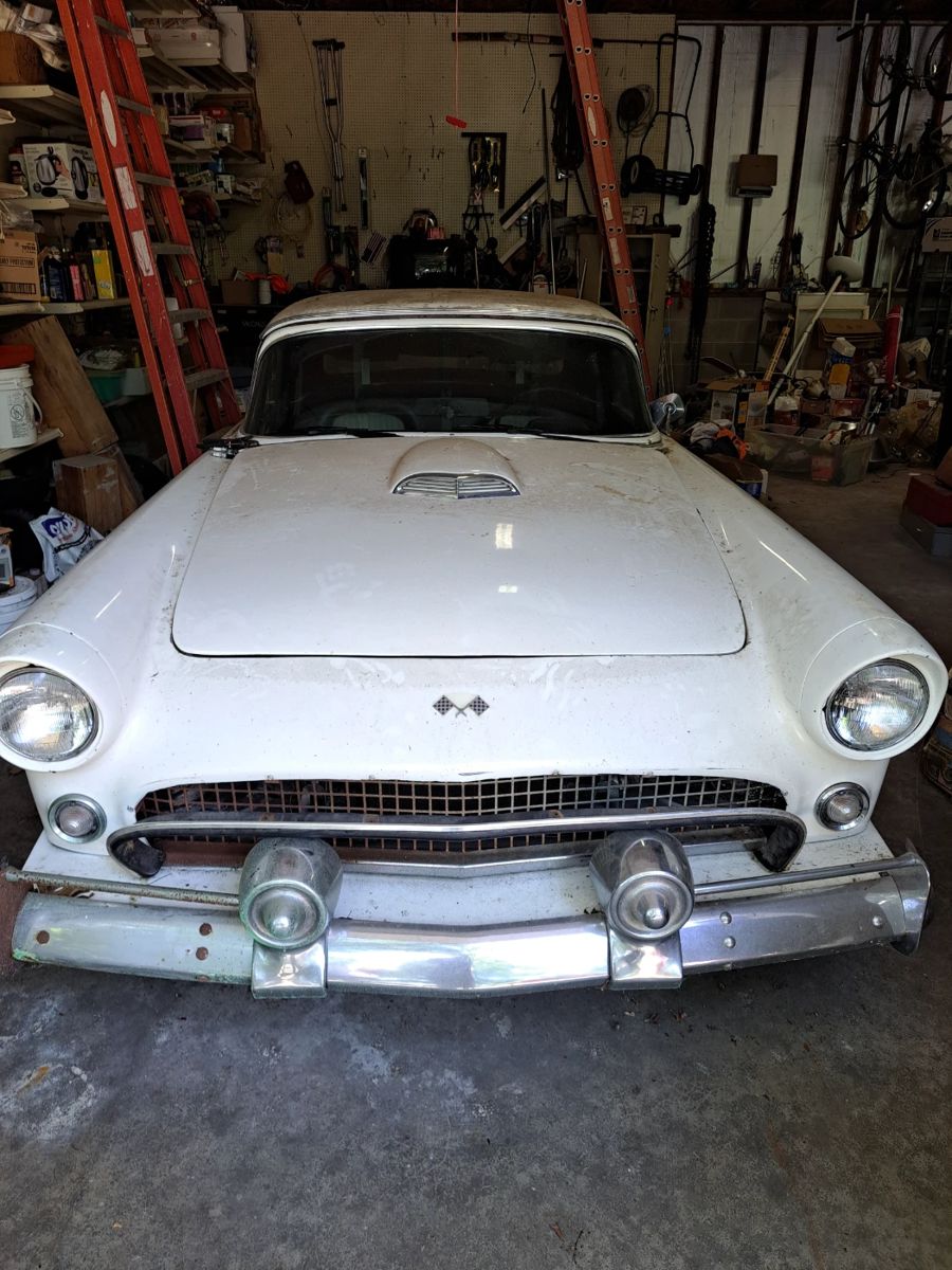 1955 Replicar Thunderbird-2 Door-removable hard top(latches on either side)-4 speed on the floor, don't start it because sparks are out of it, straight 4 cylinder carbonated engine-turns over by hand so not seized, most likely on a Mustang chastity, over the cam 4 cylinders 4-speed manual transmission, takes unleaded gas, (rubber tires are not usable), heater but no A/C, everything seems plumbed evenly because doors open & close smoothly. Most likely need to flush fuel lines due to sitting for awhile. 1955 KIT CAR THUNDERBIRD.