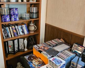 assorted DVDs and CDs (various artists from older to newer)