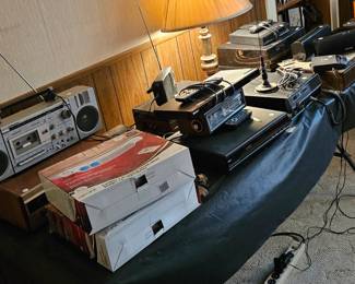 Assorted stereo equipment, radios, etc. These are all tested and work, but the record player needs help loading.