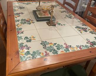  tile topped farm house table   have 5 chairs  not sure where #6 is   