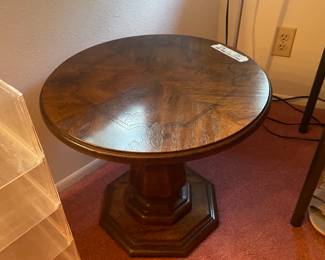 heavy small solid wood round low table - mid century height for sure 