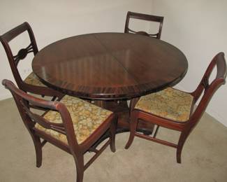 Table, 2 leaves, 4 chairs 