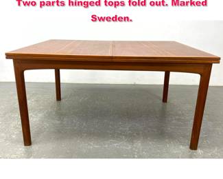 Lot 496 Swedish modern teak dining table. Two parts hinged tops fold out. Marked Sweden.