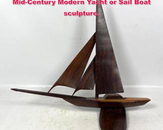 Lot 498 Decorative Handmade Rosewood MidCentury Modern Yacht or Sail Boat sculpture. 