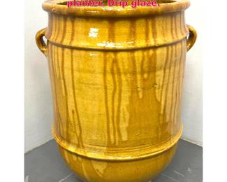 Lot 351 Large Yellow glazed terracotta urn planter. Drip glaze.