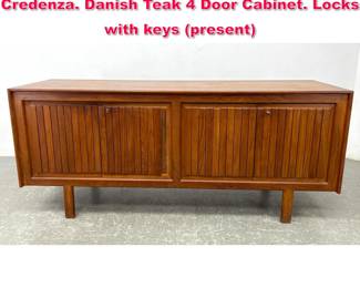 Lot 514 Arne Halvorsen Mid Century Modern Credenza. Danish Teak 4 Door Cabinet. Locks with keys present