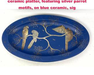Lot 285 Emilia Castillo silver overlay ceramic platter, featuring silver parrot motifs, on blue ceramic, sig