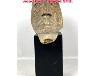 Lot 552 Waldman soapstone sculpture with wood base. Signed STU.