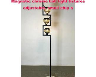 Lot 22 Angelo Lelli for Arredoluce floor lamp. Magnetic chrome ball light fixtures adjustable, small chip o