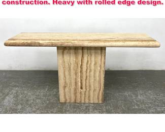 Lot 105 Travertine Sofa table. 2 pc construction. Heavy with rolled edge design.