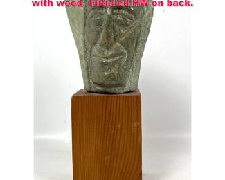 Lot 549 Waldman serpentine stone sculpture with wood. Initialed HW on back. 