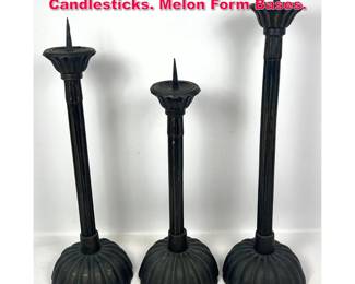 Lot 434 Set 3 Graduated Height Bronze Candlesticks. Melon Form Bases.