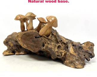 Lot 62 Carved wooden mushroom sculpture Natural wood base. 