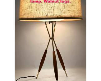 Lot 76 Good Gerald Thurston tripod table lamp. Walnut legs.
