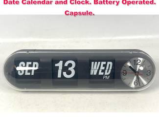 Lot 206 Pill Form Modernist Quartz Clock. Date Calendar and Clock. Battery Operated. Capsule.