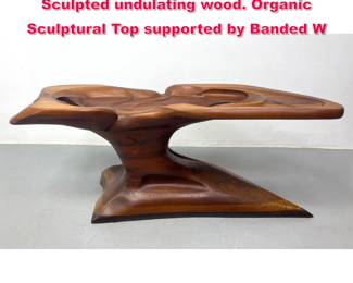 Lot 18 Handmade studio Dining Table. Sculpted undulating wood. Organic Sculptural Top supported by Banded W