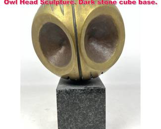 Lot 162 Modernist Bronze Sphere shaped Owl Head Sculpture. Dark stone cube base.