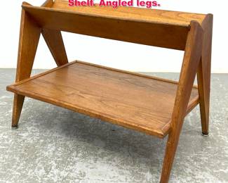 Lot 267 Pierre Jeanneret Style Book rack Shelf. Angled legs.