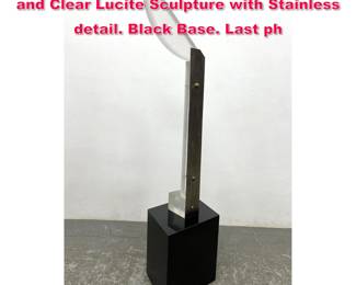 Lot 243 CONSTANCE K LIVINGSTON Frosted and Clear Lucite Sculpture with Stainless detail. Black Base. Last ph
